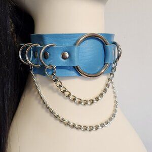Blue choker necklace fake leather with chains and rings. Fits necks 12" to 17"